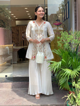 Elegant Silk Suit Set with Hand Embroidery & Zari Weaving Detailing
