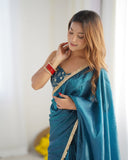 Festive Glow Embroidered Tissue Silk Saree