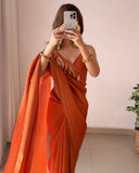 Elegant Party Wear Satin Silk Orange Saree Featuring Fine Embroidery Detailing with Blouse